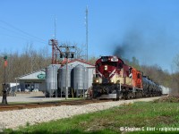 Well, this is a rare scene - how often does OSR depart Guelph Junction in the mid to late afternoon? It's 4:14 PM and the crew has departed the junction after putting together their train. If only OSR ran this late on a regular basis - it makes for some great photo opportunities. 181 and 1591 are giving 'er as the crew guides their train to track speed on GJR's class 3 track, passing the Sharpe Feed Mill in Moffat.
