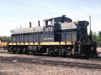 A Doug Lawson photo.
Former NAR GMD-1 311 has been renumbered back to it's original CN number after the Canadian regional property became 100% CN-owned in January 1981. These engines were all built new for CN with the A-1-A trucks for branchline service. 1072 spent time as NAR 311 from Jan1962 until Jan1981. It later became CN 1182. As was the classy touch of NAR, it carried the name TWELVE FOOT DAVIS. NAR named all of it's engines starting in about 1970 for local people and places. 1172 was retired by CN in Sept1999, was resold to a broker who then sold it to Southern Rly of BC, renumbered SRY 1205; in late 2014 it was sold by SRY to broker J&L Consulting and was deemed to be in poor condition, hence was scrapped.