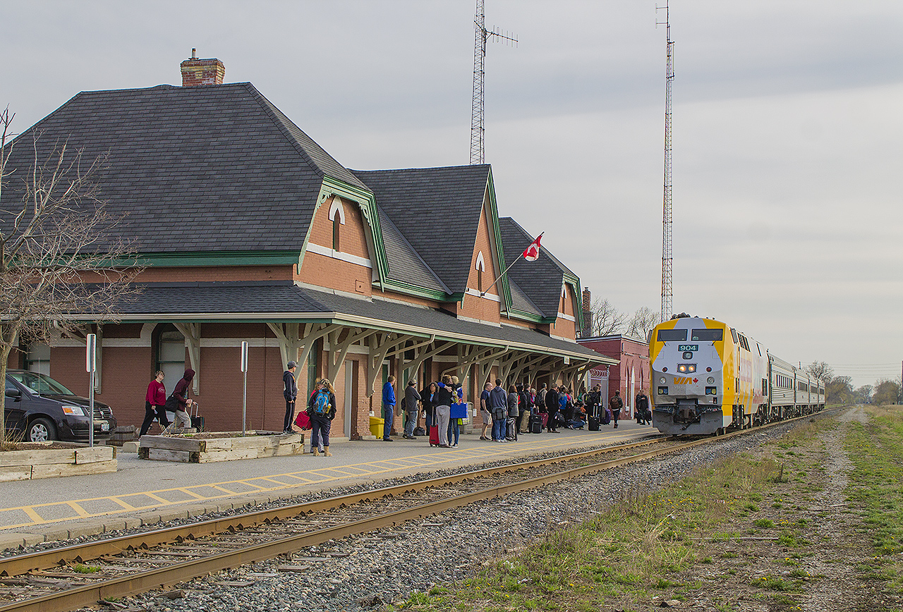 As with many, new contributors to rp.ca, I love seeing those older photos of what the railway looked like 'back in the day' - namely as I remember them being a train-loving kid growing up through the 80's. 

As Bruce Mercer started to share his photos, I couldn't help but love the ones he has posted from his time here in Chatham. But there was one that specifically caught my eye. It shows Train 72, pulling into the repainted Chatham station on a lazy Sunday afternoon. From his shot in October 1986, those old VIA F-units were the last of it's kind as the newer models started were just starting t be put into service. Chatham still had regular freight service by CN, and the main was all double tracked. Bruce's photo  can be seen by clicking here. 

Jump ahead to 30 years later. I wanted to Time Machine that photo from 1986. The difficulty in trying to do this was great - the westbound main was torn out, and the sidings that used to exist had also been truncated to end before the Lacroix Street overpass. Bruce mentioned how sad a state it is nowadays being a railfan in Chatham...and to some extent I agree. Thankfully the station hasn't changed much, and I was lucky enough to have VIA 904 in the Canada 150 wrap which surprisingly adds to the dreary scene of what used to be. Just as it was for Bruce to have captured Train 72 back then, this one is extra special for me being (hopefully) my 150th photo submitted to rp.ca.