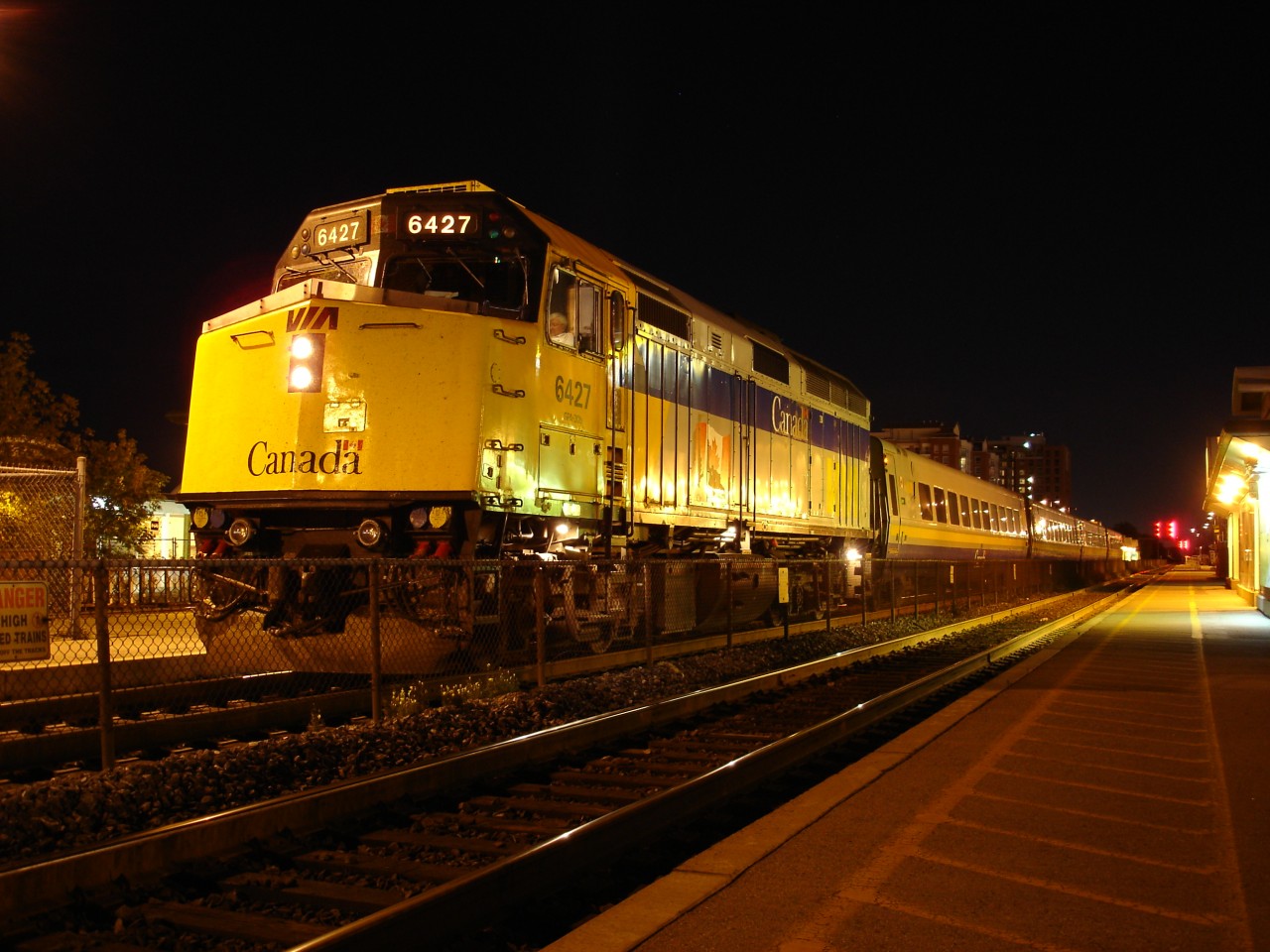 VIA 6427 pauses at Oakville before bringing train #78 to its final destination- Toronto Union Station.