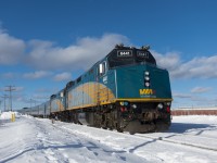 The eastbound Canadian making a service stop at Hornepayne, giving passengers an opportunity to enjoy the frigid Ontario snow.