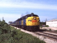 Another view at Sass Road, east of the Maple City. A pair of FPA4's are doing their MLW-best to lift train 74 out of town and up to track speed quickly. I'm no passenger car expert but I know the first coach is a Budd-built and I presume is either exCPR or one of the ones purchased 2nd/3rd hand from Amtrak surplus.
