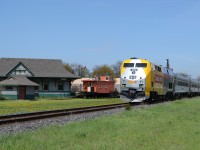 VIA 909 leads 5 HEPII coaches and Business class cars, pass the old Glencoe Station, on train #73.