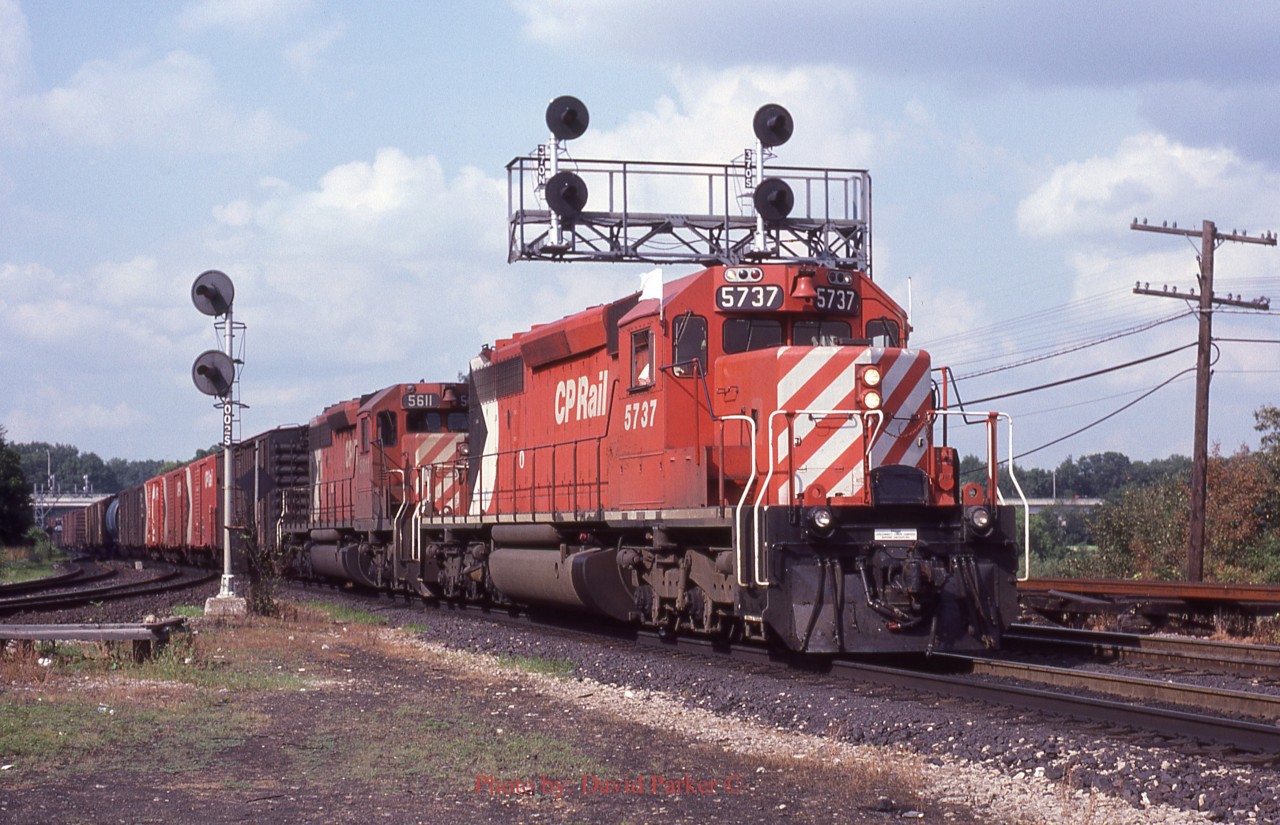 CP5737 & 5611 lead the evening "Starlight" thru Bayview Jct on July 23rd 1980. The train would enter the Oakville Sub at Canpa and would return to CP at Hamilton Jct.