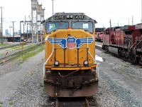 A millennium baby born in 2000, UP SD70M is waiting to go on train 241 just east of the servicing island tracks.
