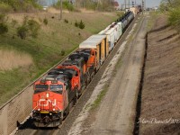 Train 371 heading to Port Huron, MI., with CN 2343, CN 5431 and a surprise trailing unit BNSF 7428.