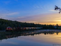 CN 2848 is westbound, as they lead a Canpotex potash train past the "unnamed lake", as they start their descent down into their final destination of Saint John, New Brunswick, with the sun on the rise!