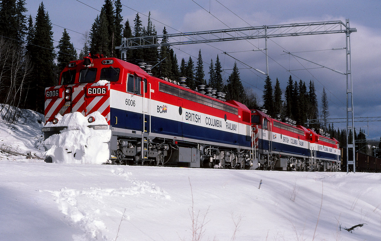 Three units on the headend of a loaded coal train at Teck waiting for crew to take south to Prince George. Quite evident that the 6006 had encountered some snow along the way. Trailing units 6003 & 6004. It was a bright sunny afternoon in Tumbler Ridge area and I went out for a drive and pictures.