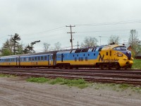 <br>
<br>
Werkspoor ' TEE ' #1981 powers Saturday only Northlander equipped VIA train #120 on approach to CN Washago.
 <br>
<br>
Daily except Saturday Trains 121 and 122 were ONR operated  Northlander service, while weekend trains 120 on Saturday, 123 Friday and Sunday and 124 Sunday were Toronto / North Bay  service only and operated for VIA. 
 <br>
<br>
The four Werkspoor 'TEE' *  units powered the four Northlander train sets at the 1976 introduction to Canada until mid 1980 when all trainsets were repowered with modified ONR FP7a units ( ONR 1519 to 1984 ; 1518 to 1985; 1501 to 1986; 1510 to 1987 ). Apparently the Werkspoor power was challenged by the northern Ontario operating conditions.
 <br>
<br>
CN Washago  was impressive at one time with a  four track main passing under the highway #11 overpass: nearest track is the service track, next two is the Bala Subdivision siding and main, far side is Newmarket Subdivision siding and main, certainly looks different here today.
 <br>
<br>
Also impressive, even up to 1989, Washago was well served weekly with 44 through passenger * trains stopping...(only find that number of weekly passenger scheduled stops in corridor service London, Kingston etc): those weekly 44 trains at Washago: 
 <br>
<br>
14 VIA #9 & #10 ( Toronto section daily VIA Canadian);
 <br>
<br>
 12 ONR #121 and #122 Northlander daily except Saturday;
 <br>
<br>
 14 VIA / ONR over night pool trains #128 & #129 daily Northland; 
 <br>
<br>
and the four weekend trains #120, #123, #124 ( shown on the Timetable as conventional, normally  Northlander equipped). 
 <br>
<br>
* built for and originally designated Trans Europe Express service
 <br>
<br>
May 12, 1979 Kodak Kodachrome 64 transported by a Nikkormat EL, by S.Danko. 
 <br>
 <br>
What's interesting, even five years after the September 2012 ONR Northlander discontinuance the Northern MPP's continue to receive constituents requests for a return of the Northlander service , and note a Provincial election is looming within the next year (2018). 
<br>
 <br>
More Northlander:
 <br>
<br>
       <a href="http://www.railpictures.ca/?attachment_id=6773">  by Albert </a> 
 <br>
<br>
        <a href="http://www.railpictures.ca/?attachment_id=14873">  by Bill T </a> 
 <br>
<br>    
    <a href="http://www.railpictures.ca/?attachment_id=19916">  Trout Creek </a> 
 <br>
<br>   
   <a href="http://www.railpictures.ca/?attachment_id=12654">  GTA </a> 
 <br>
<br>  
   <a href="http://www.railpictures.ca/?attachment_id=8047"> Nipissing </a> 
 <br>
<br>  
sdfourty
