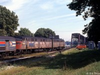 Amtrak's Niagara Rainbow is shown in Fort Erie, about to cross the International Bridge from Canada into the USA in September of 1978. An old pair of well-worn EMD E-units are today's power, typical of the early Amtrak-era equipment that was mainly hand-me-down locomotives and passenger cars from railroads wanting out of the passenger train business.
