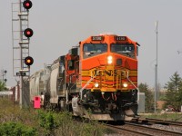 BNSF C44-9W 5190 and another BNSF unit lead an eastbound CN freight by the rarely photographed Blain crossover on the Dundas Subdivision. 