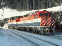 On the BC Rail, Tumbler sub, light pusher power heading north after pushing a loaded coal train "up the mountain".  This view is at Wolverine siding at approximately mile 48. Latitude & Longitude what I have shown may not be correct.