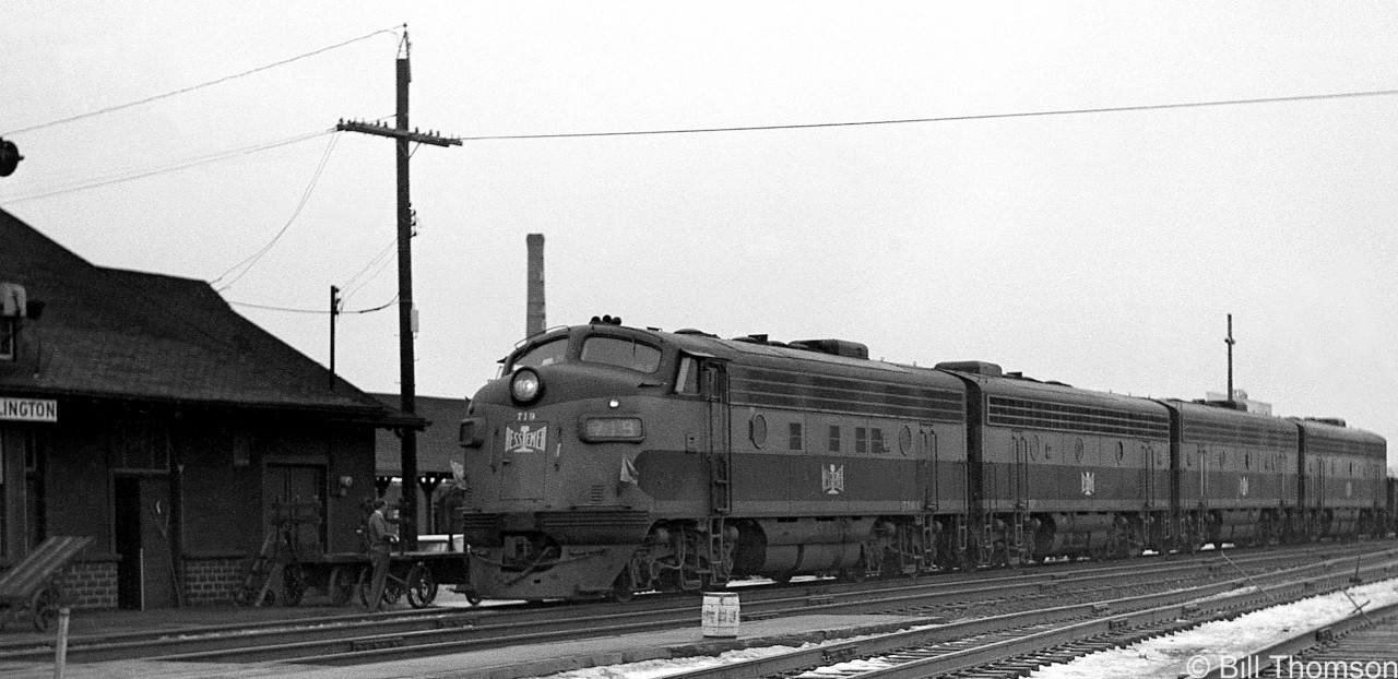 An A-B-B-B set of Bessemer & Lake Erie F-units on loan to CN are shown heading eastbound past Burlington station on CN's Oakville Sub in 1964. CN had a number of B&LE F's on lease in the mid-late 1960's period.