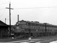 An A-B-B-B set of Bessemer & Lake Erie F-units on loan to CN are shown heading eastbound past Burlington station on CN's Oakville Sub in 1964. CN had a number of B&LE F's on lease in the mid-late 1960's period.