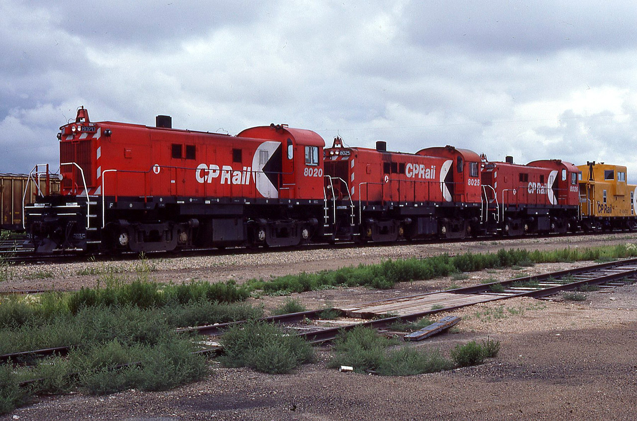 A Fred Gaines photo. MLW power on both CN and CP was generally assigned well east of Winnipeg. But there were exceptions. CP bought lightweight RS-23’s specifically for some prairie branchlines and based them at Lanigan SK. On July 15/81, Fred Gaines captured 8020-8025-8026 in (Rocket) elephant formation.
