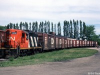 The H.J. Heinz Co. plant in Leamington Ontario was the most significant rail customer in the area, located at the end of the 13.8 mile Leamington Sub that branched off the CASO at Comber. Here, CN GP9 4373 switches a healthy cut of insulated boxcars for Heinz on May 2nd 1985. Unfortunately the plant, which opened in 1909, was closed by Heinz in 2014 (but was subsiquently sold to Highbury Canco for continued operation).