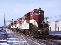 Using the inbound power off The Kinnear, CPR ran an early morning "Hamilton Extra" with 3 TH&B geeps. The westbound move had gone to Hamilton prior to 9am but the bright sunny day was not conducive to photography at that angle. So I waited for his return and was rewarded with this image. It was one of those biting cold January days where even in bright sun the snow doesn't melt. I kept warm by talking with the First Trick Operator Stan Roskovich, until the TH&B dispatcher informed the CN dispatcher that the train was on the move eastbound from Aberdeen yard. 