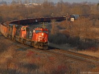 With a big slug of ballast loads on the headpin, one of the queens of the fleet leads 8818, 2413, and 369's train through the curve at Bowmanville. The trees are really encroaching on this location, guys... just sayin'. 1908hrs.