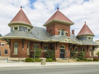 When the Great Western Railway built it's line, branching it off at London to Sarnia, they decided to tap into the oil boom that was happening in Lambton County. The main town, Petrolia, already had a railway when the Michigan Central also built a spur line to take advantage of the oil that was found so richly in this area.
<br>
<br>
Today, not much remains of the oil boom days. Smaller towns such as Oil City and Oil Springs, are only a shell of what they used to be. The Michigan Central pulled it's branchline through Lambton County in the early 60's. Most stations today have vanished from the landscape, but all is not lost. The last station standing in Petrolia, is in fact now used as their Public Library. CN ended passenger service on the line in 1930, and it's been a library ever since. Freight traffic continued on the spur line, until it too was finally lifted in the late 80's / early 90's. But the CN station is a gem. It has been well taken care of through the years.
<br>
<br>
Of note - the MC station for Petrolia was relocated and split into two to be used as a residence in Bright's Grove. The freight shed that was located in Petrolia - well, rumour has it it is used as part of the main building known as the "Oil Rig Restaurant"...just across the street from where it once stood. The former MC station for Oil Springs still exists, now part of the Oil Museum located there.