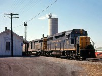 A pair of Chesapeake & Ohio EMD GP30's's with C&O 3009 in the lead head eastbound on C&O Sub 1 past the station at Wheatley ON, in 1966.<br><br><i>More C&O action nearby:</i><br>A trio of GP30's waiting by the station at Merlin ON: <a href=http://www.railpictures.ca/?attachment_id=15429><b>http://www.railpictures.ca/?attachment_id=15429</b></a><br>Two trains meeting with solid GP30 consists: <a href=http://www.railpictures.ca/?attachment_id=14951><b>http://www.railpictures.ca/?attachment_id=14951</b></a>