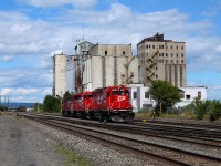 <b> GONE...but not forgotten...</b> Grain is a major commodity in the West. It was either shipped, or transported by rail. For the City of Thunder Bay, neither industry has been kind in recent years. Thankfully, the City is still a major division point for the Canadian Pacific. Here, CP 4446 is on the tail end of a remote-controlled trio of engines that are testing and will be working the yards located a little further East. As evident in the background...an abandoned grain building and former docks where the ships used to come. Also notably missing, VIA Rail. 