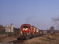 CPR SD40 5567 leads a mixed bag of power west of Newtonville. 