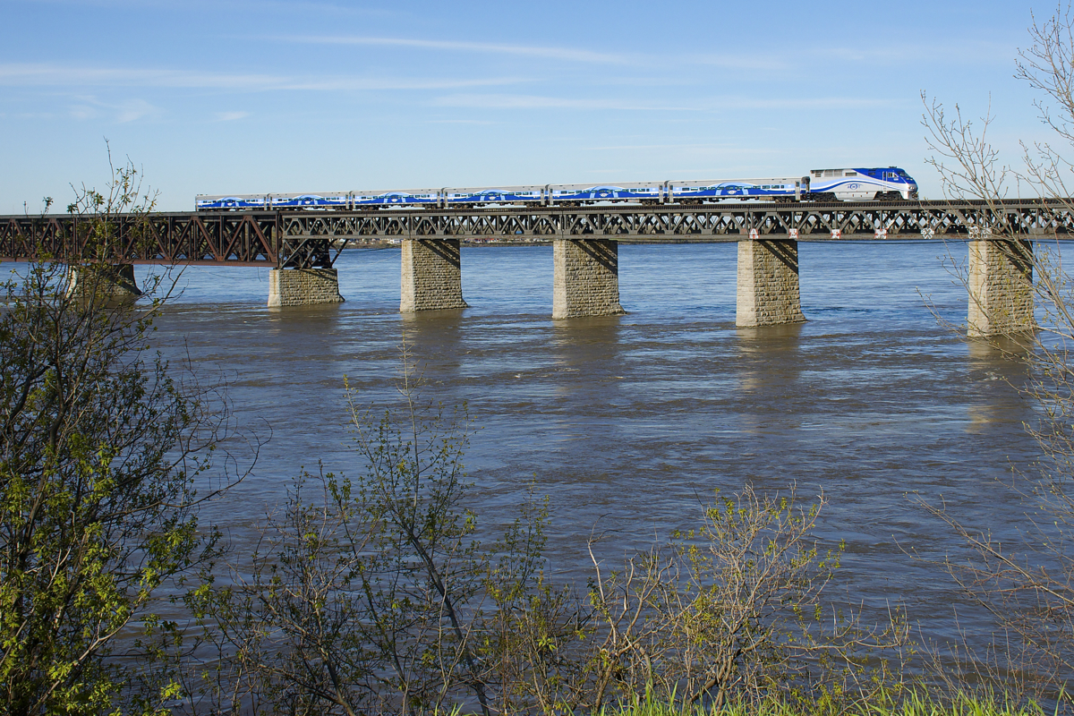 AMT 1326 pushes a deadhead move back to the South Shore as it crosses the St. Lawrence River during the morning rush hour.