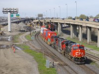 CN 120 has CN 3074, IC 1037, CN 2600 and DPU CN 2685 for power as it passes MP 6 of CN's Montreal Sub. At left is where the Lachine Spur used to leave the main line. This Toronto-Halifax intermodal train is 592 axles long on this sunny morning.