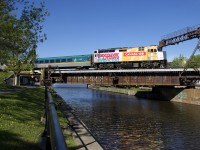 VIA 6437 is the fifth and final F40 to get a Canada 150 wrap. Here it pushes VIA 33 over the Lachine Canal after leaving Central Station in Montreal. Originating in Quebec City, the train is now heading towards Ottawa.