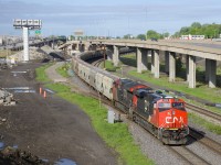 With 205 loaded potash cars and a train weighing close to 30,000 tons, CN B730 has just left Turcot West after changing crews. Power is 4 AC units with CN 2948 & CN 3065 and CN 2876 & CN 2887 mid-train.