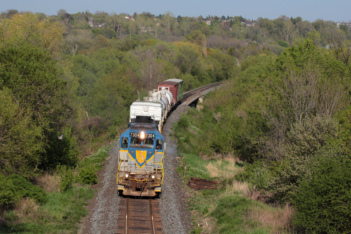 CP's weed spray program used to control vegetation on the ballast portion of CP right-of-way. This years train is seen led by a classic GP38-2 in its CP predecessor paint of Delaware and Hudson! One of only 2 left in the D&H paint (7303) Oshawa,Ontario on the CP Belleville sub