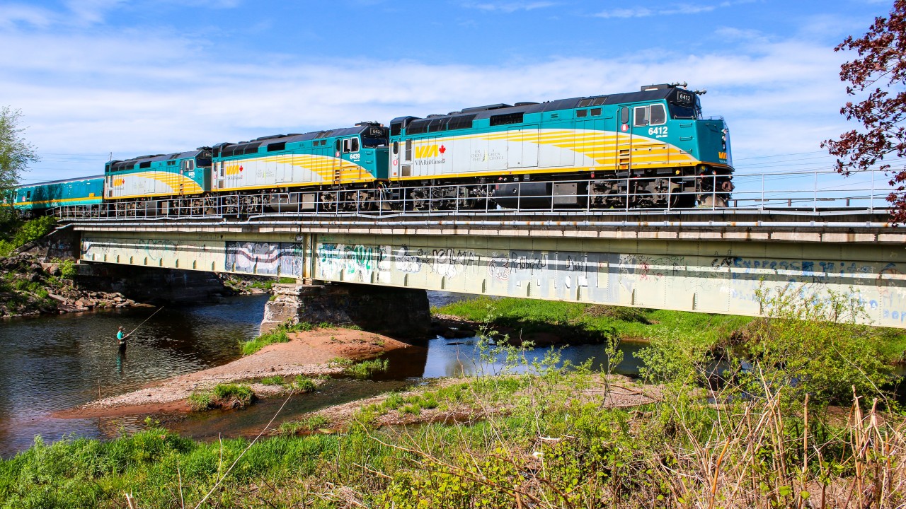 Via rail 6412 leads a passenger train across the salmon river before making a quick stop in Truro before heading to its final stop in Halifax