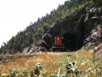 An excursion with a pair of RS-18s performs a runpast through the short tunnel between baie St Paul and Pointe au Pic.