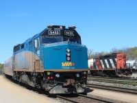 After nearly 10years of train watching I eventually caught this loco on the lunchtime eastbound VIA .Seen passing CN 4130 resting after yard duty.