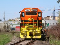 The crew of SOR train 496's day just got a bit longer. The train was rolling along the curve and switches that connect the one time CN and TH&B tracks in Brantford, when the last truck of the last car left the rails. It was decided to take all but the last two cars down to Ingenia, then return to help rerail the last car once a work crew arrived. You can see the lean on the last car. 