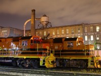 There is something addictive about capturing photos in Kitchener with the landmark H Krug factory in the background. Over my last two decades of photography I have captured a colourful array of locomotives here from CN to GEXR power in all colours, from Railtex to RailAmerica to GW. These days orange and black are most common, but the background still remains for the most part the same as it was almost a century ago. This nights power consists of units used by both trains 431/432 as well as 580.