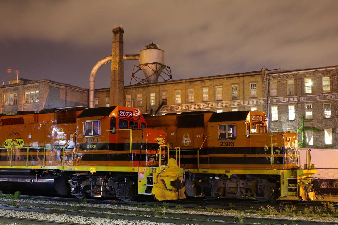 There is something addictive about capturing photos in Kitchener with the landmark H Krug factory in the background. Over my last two decades of photography I have captured a colourful array of locomotives here from CN to GEXR power in all colours, from Railtex to RailAmerica to GW. These days orange and black are most common, but the background still remains for the most part the same as it was almost a century ago. This nights power consists of units used by both trains 431/432 as well as 580.