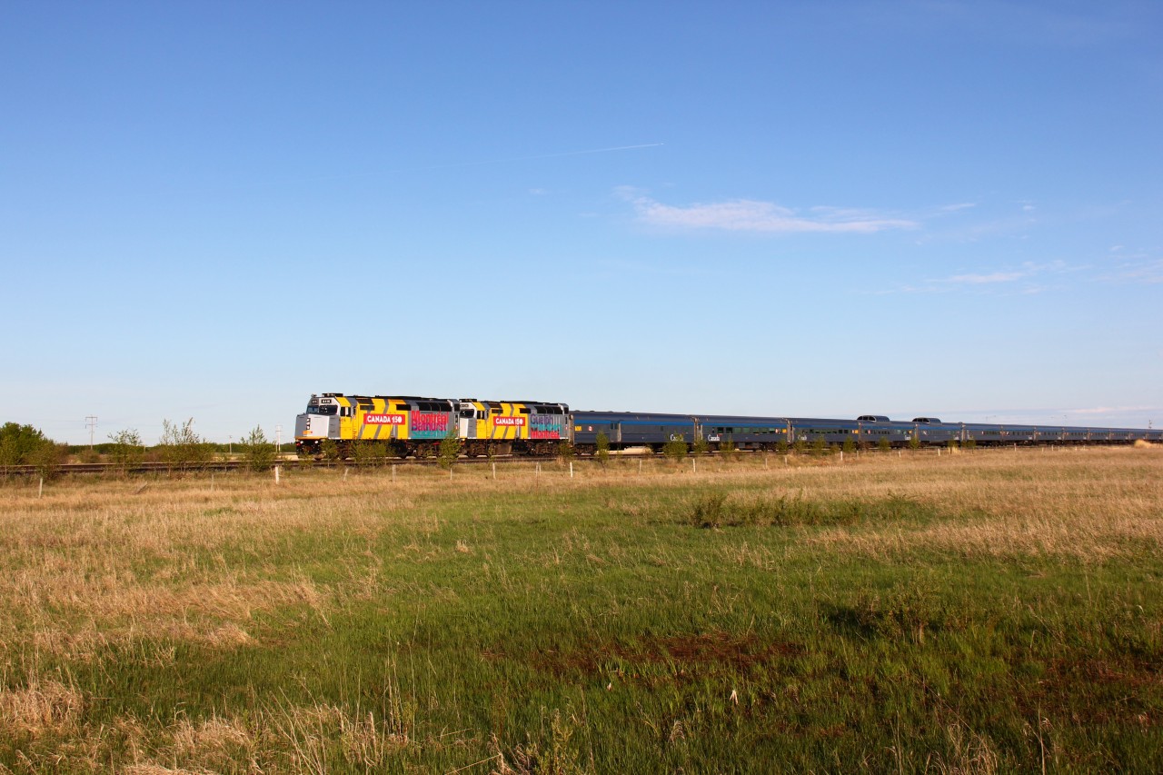 Via #2 pulls out of the siding at Ryley and onto the main after the passage of Q111.