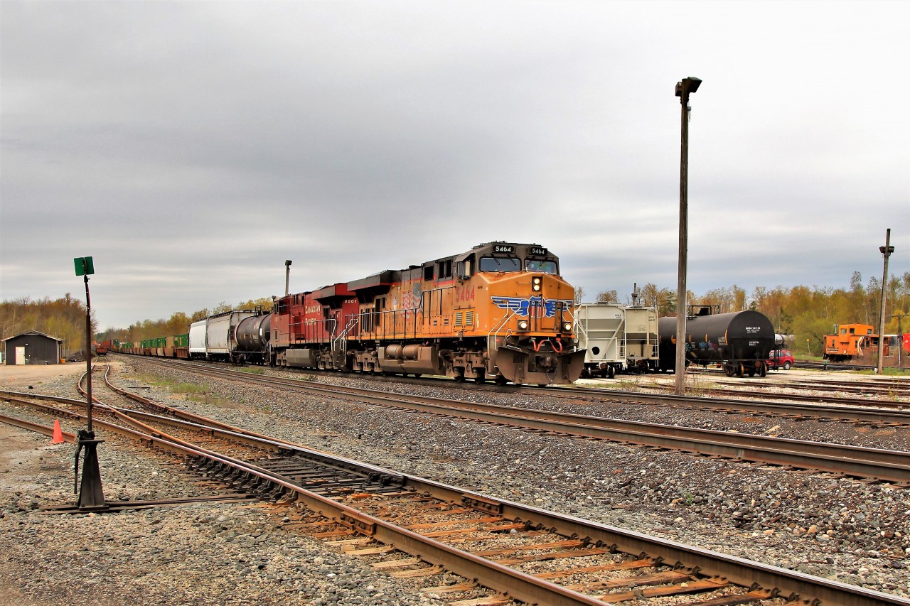 With the rerouting of CP 142 back to the Hamilton sub, this could be one of the last CP 142 coming down the Galt sub for a while. Here it is led by UP 5464 (AC45CCTE) with CP 8801 for added power on their way through Guelph Junction. As a side note, one of the OSR's cabooses sits in the siding.