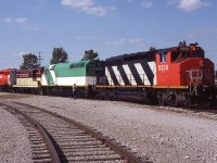 General Motors Diesel open house, September 24, 1983. On display for the public were examples of the plant's production, new and old, locomotives and otherwise. Out front where traffic passing by on Oxford Street could see them, were these 4 engines - CN SD40-2W 5330; GO F40PH 515; TH&B GP7 74; and CP SD40-2 5584(2nd). Except for the GP7, all are brand new. (CP 5584 is a replacement for the first one, wrecked and scrapped). Interesting to note that GO 515 went to Amtrak, became 415 and then went to the Panama Railway renumbered to 1861. But, how could I have known that could happen, as I waited for most of the FOAMERS to move out of my way....??
