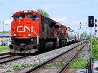 CN-8001 a C44-9wl  lead loco with CN-2340 a EF-644m both pulling a small convoy from Southwark yard going to Taschereau Yard with a drop of 3cars in the Point-St-Charles yard