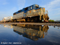 Had enough D&H yet folks? Sorry to pile on, but I think I can share one :) And in my continuing series of spring puddle shots - here's 7304 reflected in a small puddle just prior to getting under way  at 0654 in the morning. Snake, did you buy Wal-Mart stock yet? Or those water companies... BTW this is what happens when our Mr. Mooney, The D&H's biggest fan, goes away on vacation. Thanks Arnold !! :)