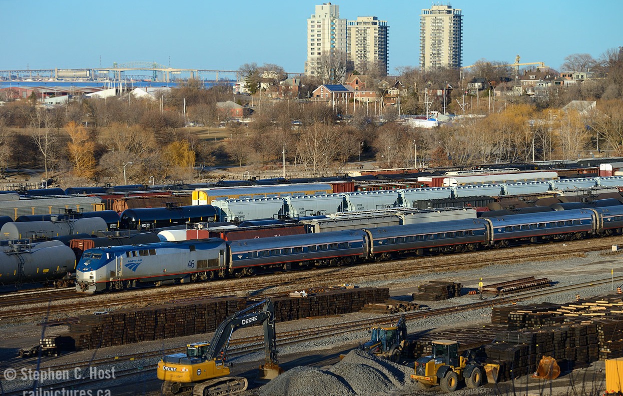 And a shot that you could only do for about a year or two - during construction of the new Cargo Flo yard (and future CN Dundurn plant) the foreground was cleared of poles and trees - and the 1964 built CN Diesel Shop -  and in the spring you can shoot Amtrak from the south side as they pass Hamilton Yard. The Burlington Skyway is in the background, as is the lift bridge (which once had rail - as seen in this