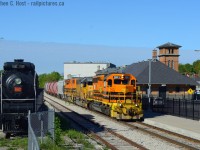 Preservation is hard. Witness the fence that , well, let's be frank, demarks the spot where 6167 should NOT have been placed. What does this mean? She's going to move again, as it's in the way of GO's expansion plans for Guelph and quite possibly foul of the siding. I commend the effort of the Locomotive 6167 Restoration Team who for 8 years guided the process toward this locomotives restoration, but someone in the ranks of the City's Engineers made an error when allowing this locomotive to be placed here, the City now pays rent to CNR since this was supposed to be placed on City owned land, not over the right of way.<br><br>
How can you help? Get involved in your local preservation efforts. While the City of Guelph owns this locomotive, it's through groups like the <a href=http://www.ghra.ca target=_blank>Guelph Historical Railway Association</a> and other Railway Museums in Canada that locomotives such as this even continue to exist in preserved form, and your support is highly appreciated. Join your local preservation group, or heck, join them from a distance and show your support. For those with a bit more time or energy, getting involved in preservation efforts is a good thing also. There's great locomotives and museums all over this country and unlike other countries, they really need your support!<br><br>
And the fate of 6167? The rumours are swirling that it has to be moved again, and a new group of preservationists have to stand up for this locomotive and make sure it is done properly and in a way preserving it's honour. The members of the GHRA, some of which who took care of this locomotive since it arrived in 1967 will be the voice of this locomotive, as well as the fine folk who volunteer with the City on the restoration Committee. Preservation is hard, very hard work indeed.<br><br>
And on a personal note to the folks at Metrolinx/GO: What's wrong if this locomotive is incorporated into the South Platform? A locomotive that hauled millions of passengers should be a fitting addition to a GO station and a monument to the technology of the first half of the 20th century that made it possible. I really see no reason why it should move very far from where it is now.