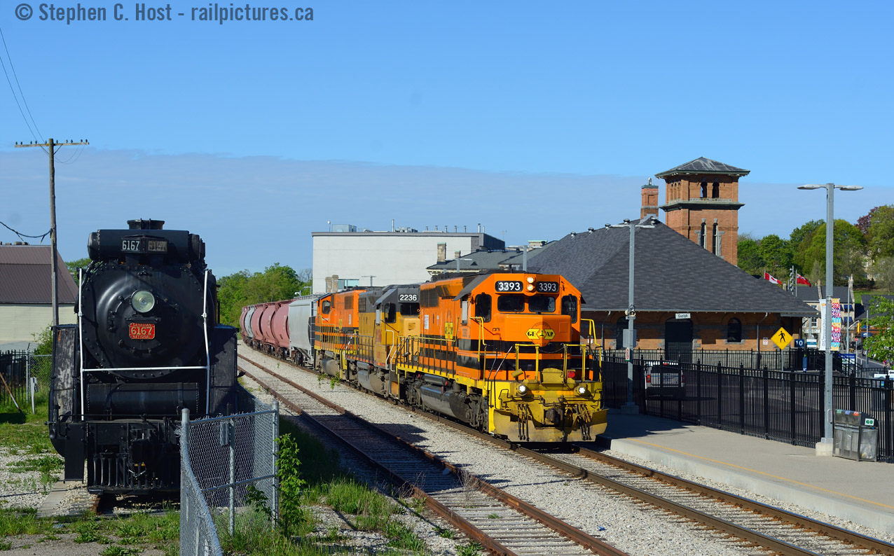 Preservation is hard. Witness the fence that , well, let's be frank, demarks the spot where 6167 should NOT have been placed. What does this mean? She's going to move again, as it's in the way of GO's expansion plans for Guelph and quite possibly foul of the siding. I commend the effort of the Locomotive 6167 Restoration Team who for 8 years guided the process toward this locomotives restoration, but someone in the ranks of the City's Engineers made an error when allowing this locomotive to be placed here, the City now pays rent to CNR since this was supposed to be placed on City owned land, not over the right of way.
How can you help? Get involved in your local preservation efforts. While the City of Guelph owns this locomotive, it's through groups like the Guelph Historical Railway Association and other Railway Museums in Canada that locomotives such as this even continue to exist in preserved form, and your support is highly appreciated. Join your local preservation group, or heck, join them from a distance and show your support. For those with a bit more time or energy, getting involved in preservation efforts is a good thing also. There's great locomotives and museums all over this country and unlike other countries, they really need your support!
And the fate of 6167? The rumours are swirling that it has to be moved again, and a new group of preservationists have to stand up for this locomotive and make sure it is done properly and in a way preserving it's honour. The members of the GHRA, some of which who took care of this locomotive since it arrived in 1967 will be the voice of this locomotive, as well as the fine folk who volunteer with the City on the restoration Committee. Preservation is hard, very hard work indeed.
And on a personal note to the folks at Metrolinx/GO: What's wrong if this locomotive is incorporated into the South Platform? A locomotive that hauled millions of passengers should be a fitting addition to a GO station and a monument to the technology of the first half of the 20th century that made it possible. I really see no reason why it should move very far from where it is now.