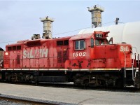 Former CP high nose GP7 8421 is shown here just after retirement in it's ST.Lawrence & Hudson paint scheme awaiting shipment to the SRY in BC for scrapping.