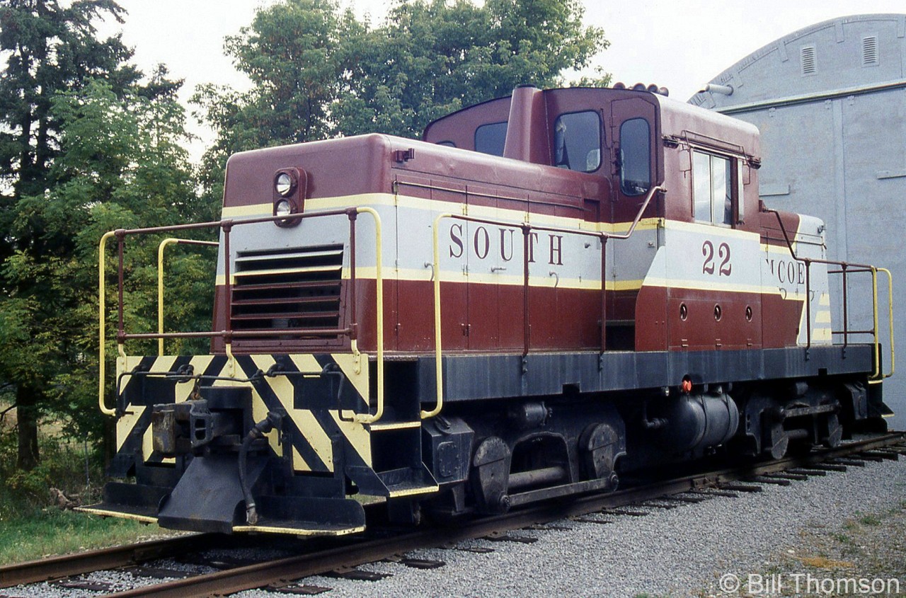 Former Canadian Pacific DTC siderod switcher 22 pictured at the South Simcoe Railway in Tottenham, on October 6th 2000. Built by CLC of Kingston in 1960, unit 22 served many places over the years, including CP's Weston Shops in Winnipeg, Sherbrooke QC, and several spots in New Brunswick. The unit was retired by CP in June 1978 and donated in January 1979 to the Ontario Rail Association, owner of the former CP D10h 1057 (ORA became the South Simcoe Railway in the late 1980's when they started setting up their present tourist RR operation).