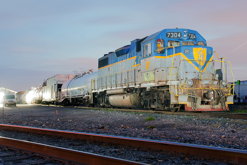 I wasn't happy about last nights photo shoot of the 7304, so here is part two. After spraying down the Hamilton Sub and the surrounding spurs in the Niagara region, DH7304 cools her heals at the jct once again, the crew has gone back to London, word is eastbound 244 will lift the train and bring it to Toronto for servicing and inspection.