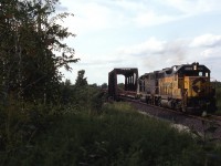 Today it is CPRail's turn to be operating a Nanticoke Steel train. Prior to the "Cainsville Fill" landslide, this train operated from Aberdeen Yard in Hamilton, west to Waterford, then onto the former LE&N right of way to Simcoe, then on to the CN Cayuga Sub to Garnet, then south again to Nanticoke. In this timeframe, CP is using leased B&O and C&O GP38's, either in pairs or trios, to handle the train. So here we have B&O 4806 ( with C&O 4823) pulling a CPRail train, on former Lake Erie & Northern trackage, and using the steel truss bridge to cross overhead of Conrail, former NYC, Canada Division mainline ! (and technically the last few cars may still be on the former TH&B Waterford Sub).