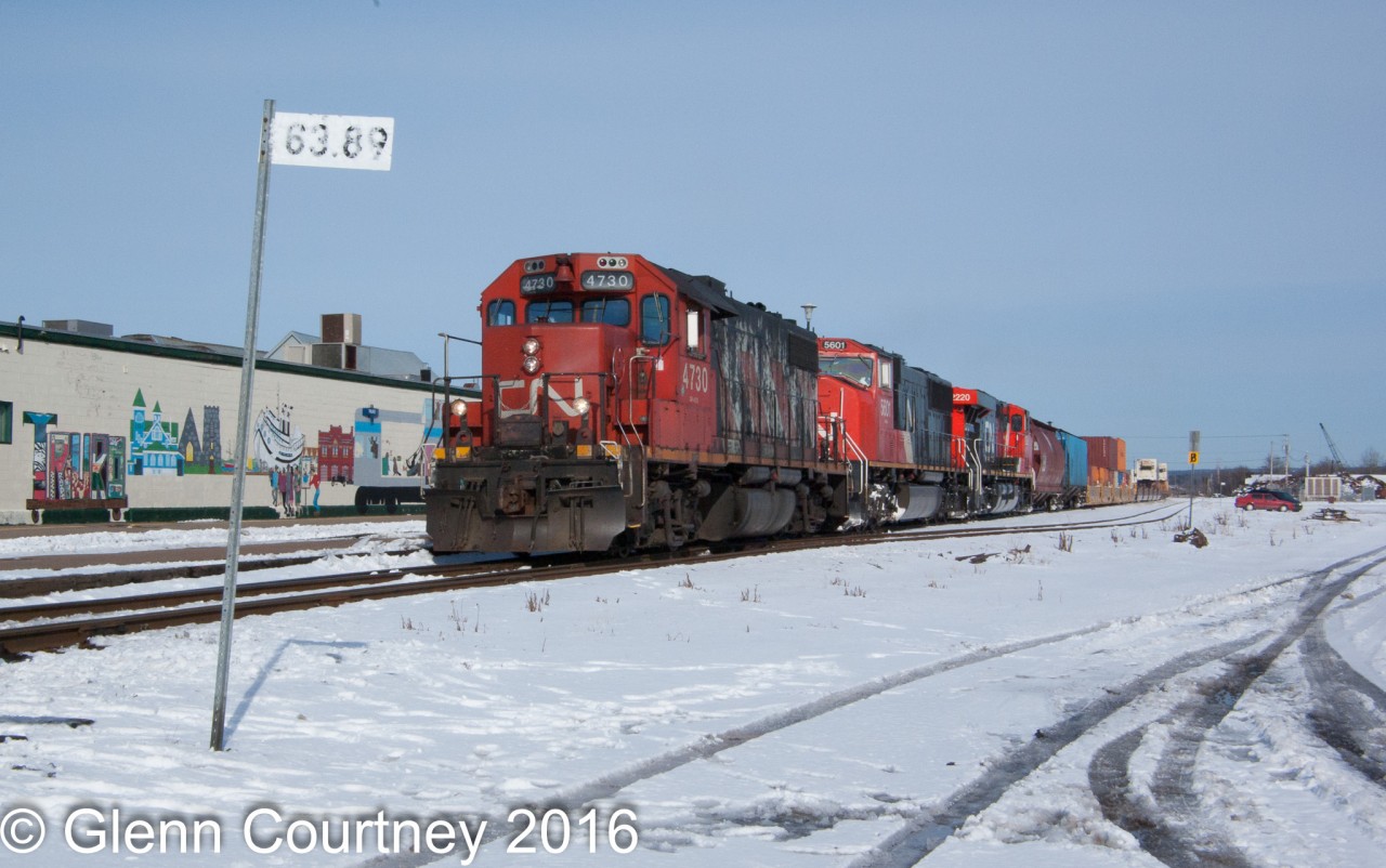 CN #120 obviously had some problems during the night and picked up GP38-2 4730 somewhere along the way to lead it into Halifax.